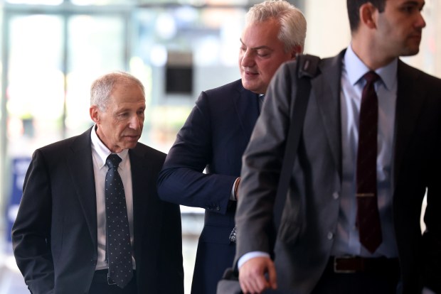 Paul La Schiazza, left, leaves the Dirksen U.S. Courthouse on Monday, Sept. 16, 2024. (Antonio Perez/Chicago Tribune)