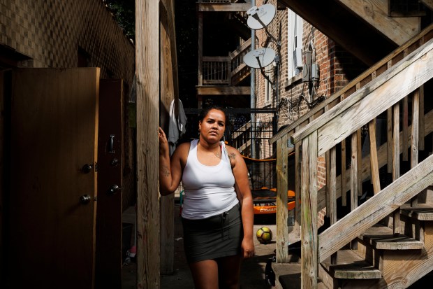 Yamile Perez poses outside her home in the South Shore neighborhood on Aug. 7, 2024 in Chicago. (Armando L. Sanchez/Chicago Tribune)