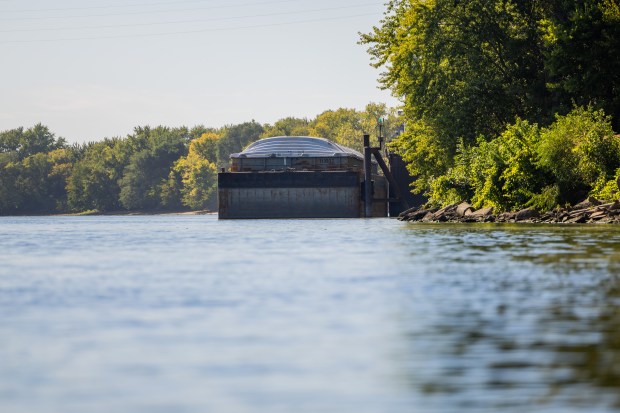 A barge is parked on the Illinois River near the William G. Stratton State Park in Morris on Sept. 20, 2024. (Tess Crowley/Chicago Tribune)