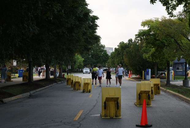 The only access road to Northerly Island is blocked off by security barriers at Huntington Bank Pavilion before a concert on Aug. 28, 2024. (John J. Kim/Chicago Tribune)