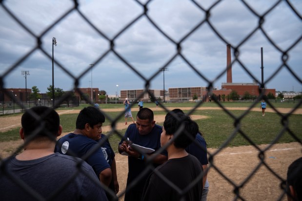 New Life Centers weekly softball game for at-risk youth at La Villita Park in the Little Village neighborhood, Thursday, Aug. 8, 2024. (E. Jason Wambsgans/Chicago Tribune)