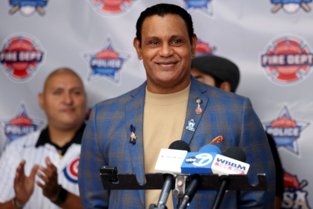 Former Chicago Cubs star player Sammy Sosa speaks at the Chicago Fire Department firehouse Engine 98/Ambulance 11, before presenting a $10,000 donation to charities , EMWQ Retirees, Widows' & Children's Assistance Fund and Light the Line, that supports Chicago Police Department. (Antonio Perez/Chicago Tribune)