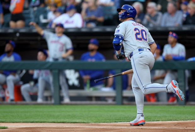 New York Mets first baseman Pete Alonso (20) watches the flight of his 2-run home run in the first inning of a game against the Chicago White Sox at Guaranteed Rate Field in Chicago on Aug. 31, 2024. (Chris Sweda/Chicago Tribune)