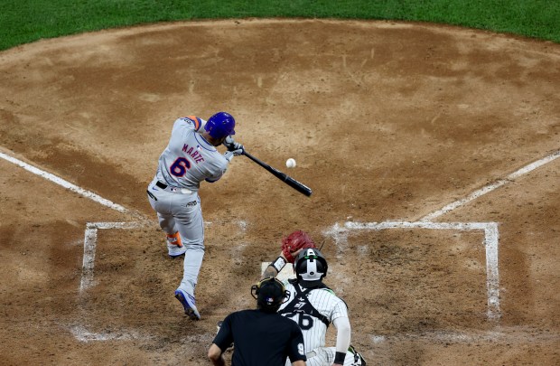 New York Mets right fielder Starling Marte (6) drives in a run with a single in the sixth inning of a game against the Chicago White Sox at Guaranteed Rate Field in Chicago on Aug. 31, 2024. (Chris Sweda/Chicago Tribune)