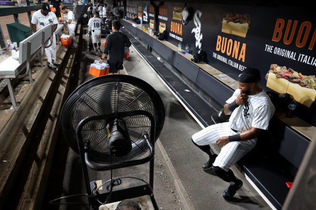 White Sox right fielder Corey Julks sits in the dugout after a 5-3 loss to the Mets on Aug. 31, 2024, at Guaranteed Rate Field. (Chris Sweda/Chicago Tribune)