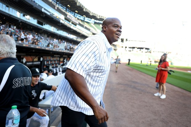 Chicago White Sox great Frank Thomas comes out of the Sox dugout prior to throwing out a ceremonial first pitch before a game against the New York Mets at Guaranteed Rate Field in Chicago on Aug. 31, 2024. (Chris Sweda/Chicago Tribune)