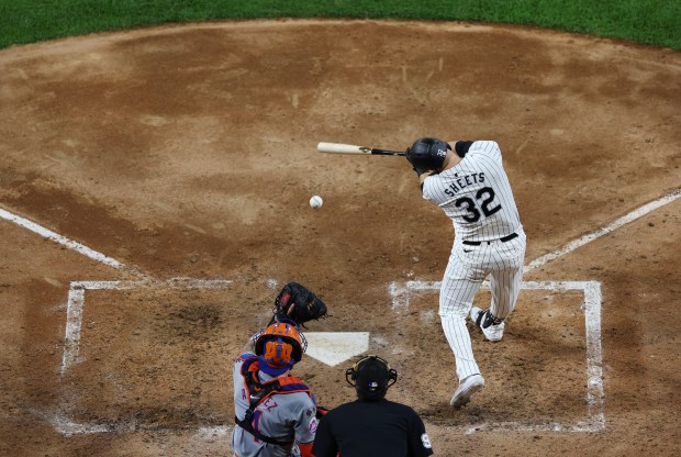 White Sox designated hitter Gavin Sheets swings and misses on a pitch in the fifth inning against the Mets on Aug. 31, 2024, at Guaranteed Rate Field. Sheets went on to ground out. (Chris Sweda/Chicago Tribune)