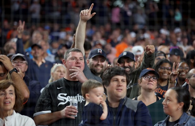 A Chicago White Sox fan reacts in the stands as Detroit Tigers celebrate after their team made the playoffs after a game between the two teams at Comerica Park in Detroit on Sept. 27, 2024. (Chris Sweda/Chicago Tribune)