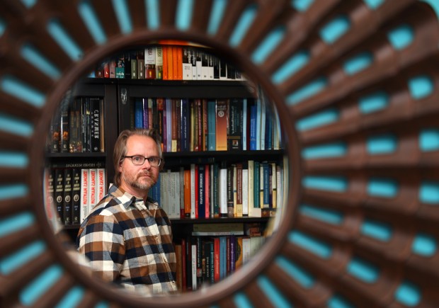 Former Wheaton College visiting assistant professor Joey Cochran at his home in North Riverside on Sept. 20, 2024. Cochran, a father of four, is currently a visiting professor at Purdue University Northwest. (Stacey Wescott/Chicago Tribune)