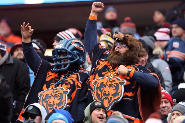 Bears fans cheer during a game at Soldier Field on Dec. 10, 2023. (Chris Sweda/Chicago Tribune)