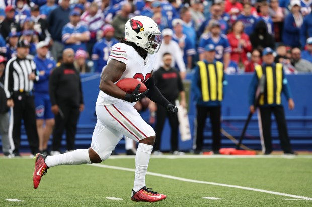 Cardinals' DeeJay Dallas returns a kickoff for a touchdown against the Bills during the second half on Sept. 8, 2024, in Orchard Park, N.Y. (AP Photo/Jeffrey T. Barnes)