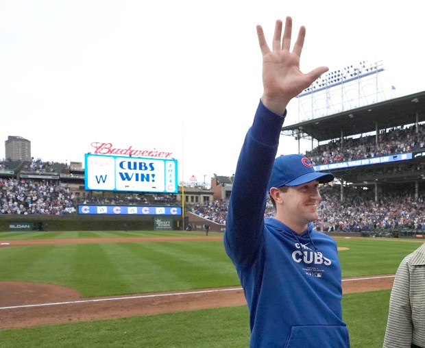 Kyle Hendricks acknowledges the crowd after the Cubs' 3-0 win against the Reds on Sept. 28, 2024, at Wrigley Field. (Charles Rex Arbogast/AP)