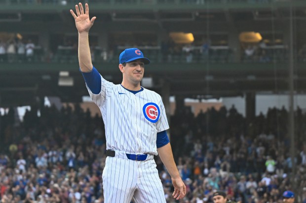 Cubs starting pitcher Kyle Hendricks waves to the crowd after being pulled in the top of the eighth inning against the Reds on Sept. 28, 2024, at Wrigley Field. (Quinn Harris/Getty)