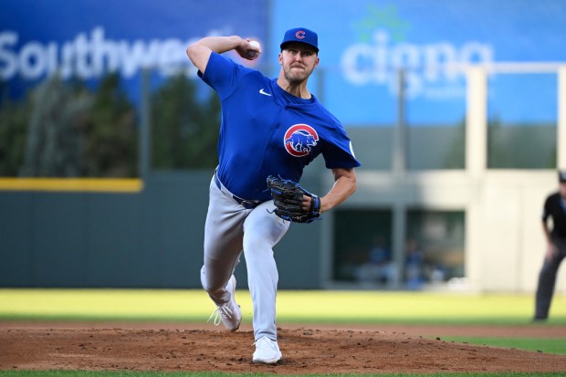 Chicago Cubs starting pitcher Jameson Taillon throws in the first inning of a baseball game against the Colorado Rockies, Saturday, Sept. 14, 2024, in Denver. (AP Photo/Geneva Heffernan)