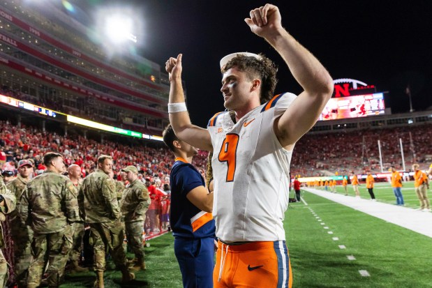 Illinois quarterback Luke Altmyer celebrates while exiting the field after a 31-24 overtime victory against Nebraska on Sept. 20, 2024, in Lincoln, Neb. (Bonnie Ryan/AP)