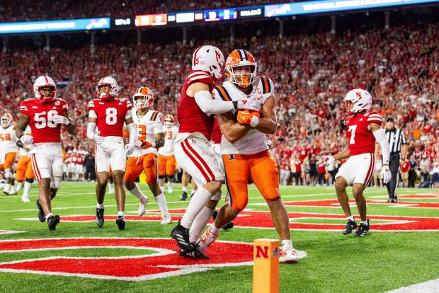 Illinois tight end Tanner Arkin scores a touchdown during the second half against Nebraskaon Sept. 20, 2024, in Lincoln, Neb. (Bonnie Ryan/AP)