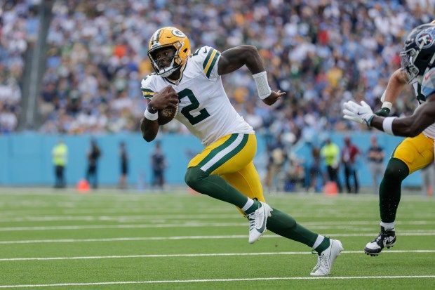 Green Bay Packers quarterback Malik Willis (2) runs for a touchdown during the first half of an NFL football game against the Tennessee Titans, Sunday, Sept. 22, 2024, in Nashville, Tenn. (AP Photo/Stew Milne)