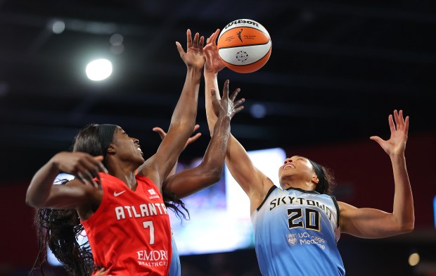 The Sky's Isabelle Harrison, right, battles the Dream's Laeticia Amihere for a rebound on Sept. 17, 2024, in College Park, Ga. The Sky lost 86-70. (Kevin C. Cox/Getty)