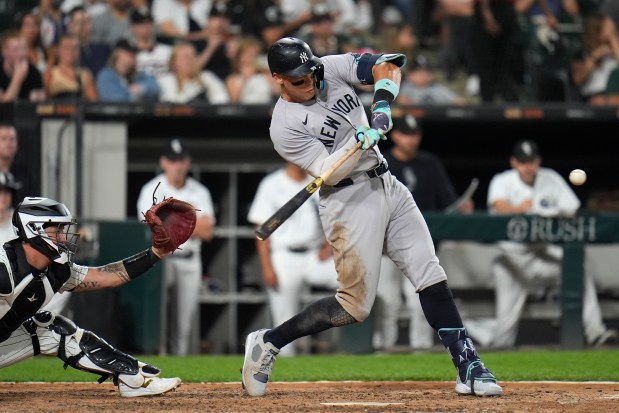 Yankees designated hitter Aaron Judge hits his 300th career home run, the fastest player in MLB history to do so, during the eighth inning against the White Sox on Aug. 14, 2024, at Guaranteed Rate Field. (Erin Hooley/AP)