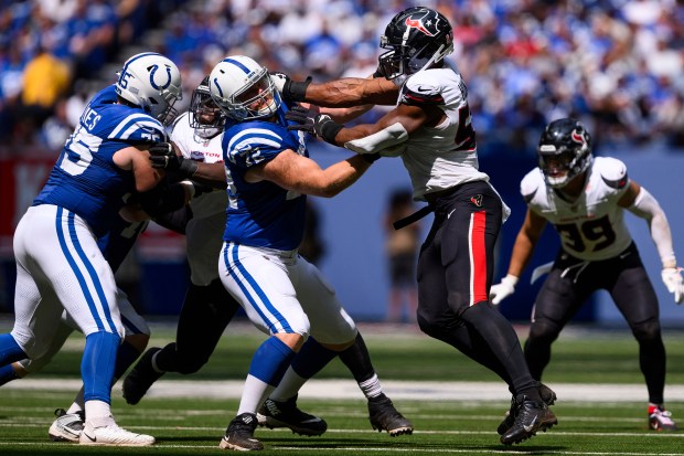 Texans defensive end Danielle Hunter rushes into the backfield against Colts tackle Braden Smith on Sept. 8, 2024, in Indianapolis. The Texans defeated the Colts 29-27. (Zach Bolinger/AP)