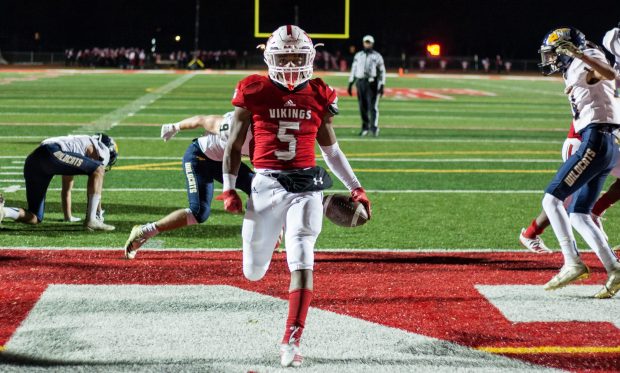 Homewood Flossmoor running back Sean Allen scores the second of his four rushing touchdowns against Neuqua Valley during a Class 8A second-round playoff game on Saturday, Nov. 9, 2019.