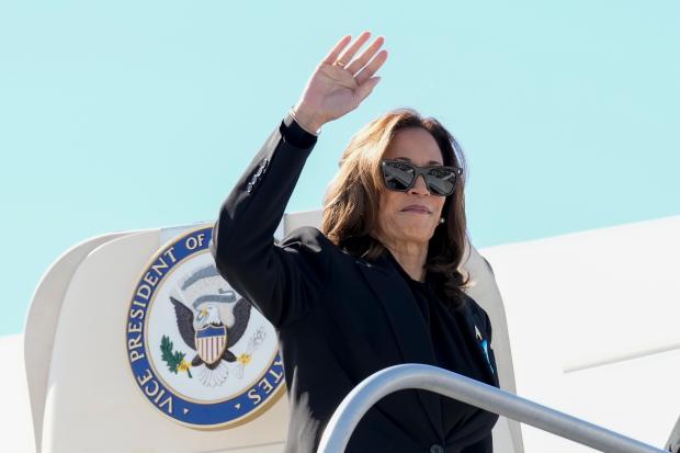 Democratic presidential nominee Vice President Kamala Harris boards Air Force Two at LaGuardia Airport in East Elmhurst, N.Y., Wednesday, Sept. 11, 2024. (AP Photo/Jacquelyn Martin)