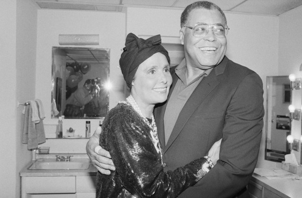 Singer Lena Horne with friend James Earl Jones backstage at the Broadway opening of "Fences" by playwright August Wilson.