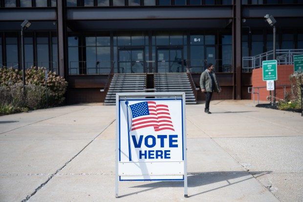 A sign stands outside of the Lake County Government Center in Crown Point on the first day of early voting in the county on Wednesday, October 11, 2023. (Kyle Telechan for the Post-Tribune)