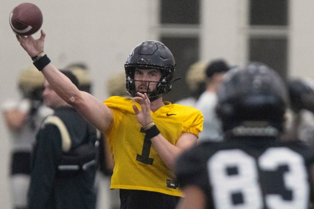 Purdue quarterback Hudson Card throws at practice on April 13, 2023, in West Lafayette, Ind. (Alex Martin/AP)