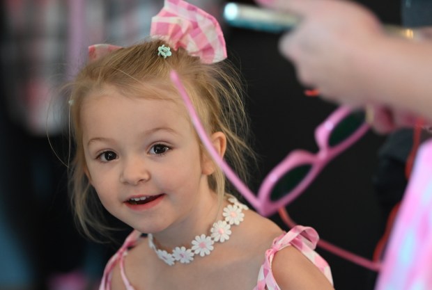 Audrey Popp, 3, of Round Lake is here to check in and attend the Launch Party/Birthday Party and Fashion Show at The Rivalry Alehouse at Barbie's Birthday Bash-Family Style on Sept. 28, 2024 in downtown Antioch. (Karie Angell Luc/Lake County News-Sun)