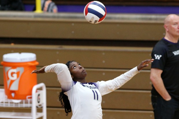 Waukegan's Hadassah Brown (11), serving the ball during the volleyball game on Wednesday, Sept. 11, 2024, in Waukegan.  (Mark Ukena for the Lake County News-Sun)