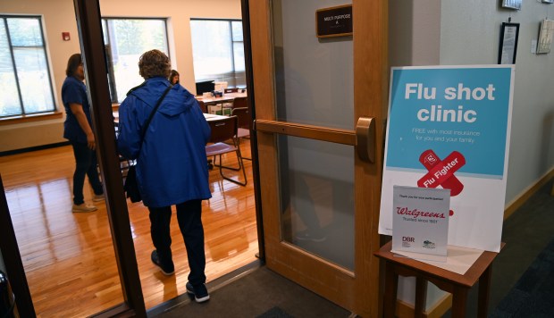 A patron enters the flu clinic being offered by the Deerfield Walgreens at the Healthy Lifestyle Expo on Sept. 7, 2024 in Deerfield at the Patty Turner Center. (Karie Angell Luc/Lake County News-Sun)