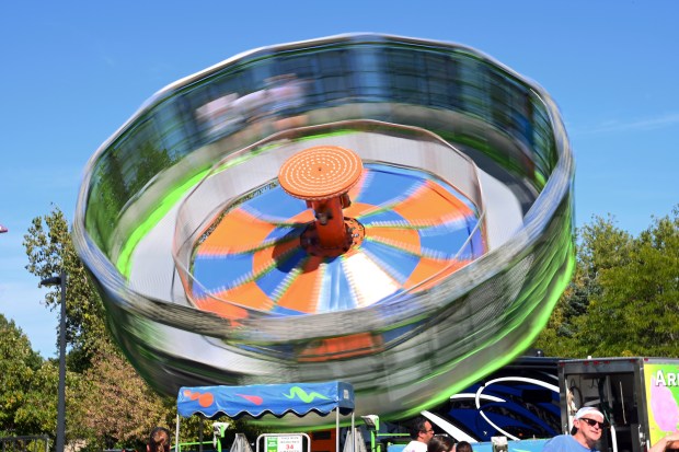 The Zero Gravity ride looks cool under a hot Saturday afternoon at Apple Fest in Long Grove on Sept. 21, 2024. (Karie Angell Luc/Lake County News-Sun)