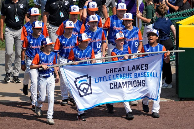 The Great Lakes Region Champions from Hinsdale, Ill., participates in the opening ceremony of the 2024 Little League World Series baseball tournament in South Williamsport, Pa., Aug. 14, 2024. (Tom E. Puskar/AP)