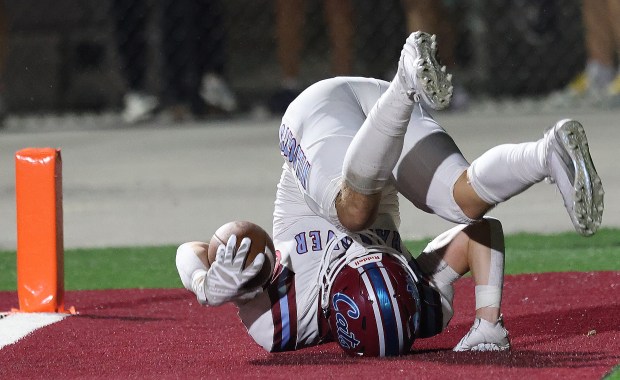 Hanover Central's Rocco Bartolomeo goes head over heals as he scores against Lowell during a Northwest Crossroads Conference game in Lowell on Friday, Sept. 13, 2024. (John Smierciak/Post Tribune)