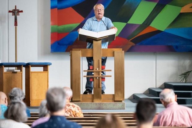 St. Mary of the Lake congregant Scott Williams speaks before the church during mass on Sunday, Sept. 15, 2024. (Kyle Telechan/for the Post-Tribune)