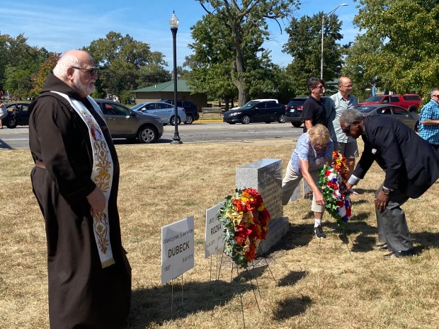 In the ceremony, union members, historical society members and local leaders lay floral wreaths on Saturday, Sept. 14, 2024, at the Hammond memorial site to honor the four men who were killed. (Anna Ortiz/for Post-Tribune)