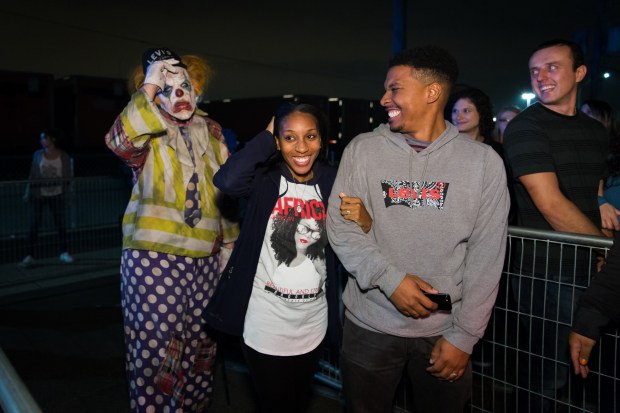 A scary clown greets guests at the 13th Floor Haunted House in Schiller Park. The haunt is open from Sept. 13 to Nov. 9. (Thirteenth Floor Entertainment Group)