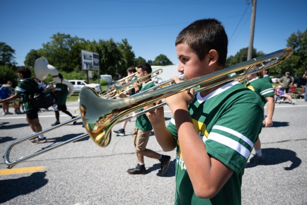 Morgan Township Band member Bronson Payne performs during the annual Malden Labor Day parade on Monday, Sept. 2, 2024. (Kyle Telechan/for the Post-Tribune)