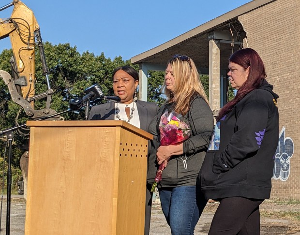 Gary Superintendent Yvonne Strokes told the sisters of Adriana Saucedo she hopes the demolition of Norton Elementary brings closure to their family. From left are Stokes, Paula Biller, and Diana Meeks. (Carole Carlson/Post-Tribune)