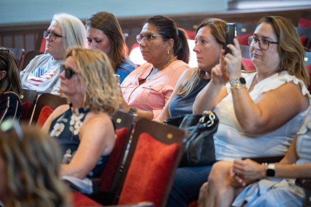 Visitors listen during a ceremony to rededicate the newly-renovated Memorial Opera House in Valparaiso on Friday, Sept. 13, 2024. (Kyle Telechan/for the Post-Tribune)