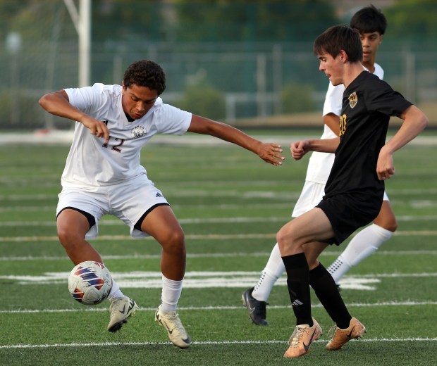 Argo's Abraham Horta (12) controls the ball during the game against Oak Forest in Oak Forest on Thursday, Sept. 12, 2024. (James C. Svehla / Daily Southtown)