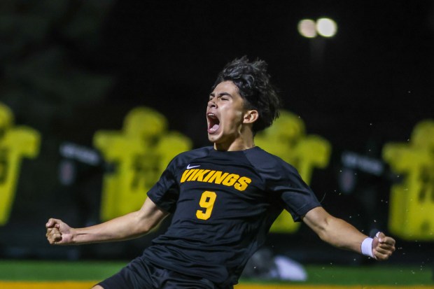 St. Laurence's Maxx Figueroa (9) celebrates after scoring a penalty kick against Brother Rice during a CCL game in Burbank on Thursday, Sept. 19, 2024. (Troy Stolt / Daily Southtown)