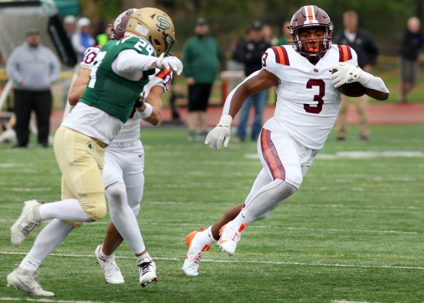 Brother Rice Tyler Lofton (3) runs the ball through against St. Patrick during the game held at Triton College in River Grove on Saturday, Sept. 28, 2024. (James C. Svehla / Daily Southtown)