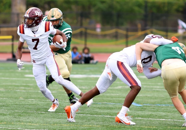 Brother Rice's KJ Morris (7) runs the ball against St. Patrick during the game held at Triton College in River Grove on Saturday, Sept. 28, 2024. (James C. Svehla / Daily Southtown)