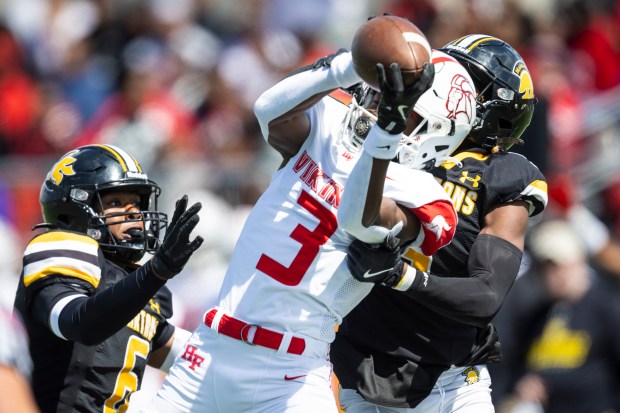 Homewood-Flossmoor's Myles Ellis (3) hauls in a pass against Marian Catholic during a nonconference game in Chicago Heights on Saturday, Sept. 7, 2024. (Vincent D. Johnson / Daily Southtown)