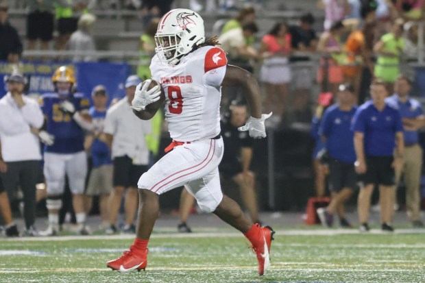 Homewood-Flossmoor's Michael Terrell (8) runs the ball against Sandburg during a non conference game in Orland Park on Friday, Sept. 13, 2024. (Troy Stolt / Daily Southtown)