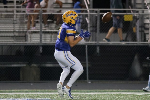 Sandburg's Charlie Snoreck (11) makes a catch against Homewood-Flossmoor during a non conference game in Orland Park on Friday, Sept. 13, 2024. (Troy Stolt / Daily Southtown)