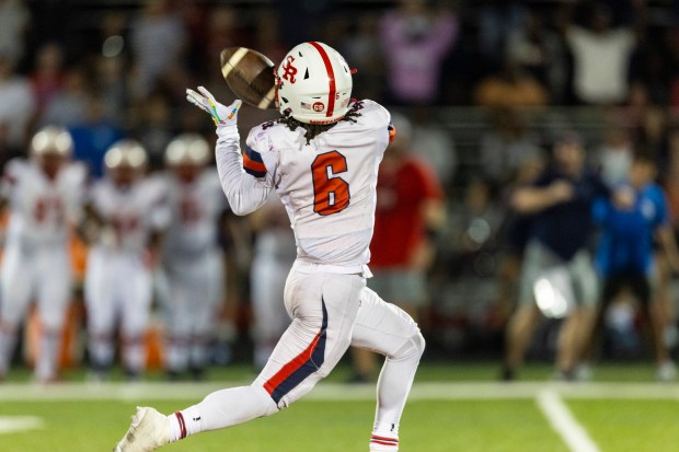 St. Rita's Walter Jones (6) catches the game winning touchdown against Brother Rice during a CCL/ESCC game in Chicago on Friday, Sept. 13, 2024. (Vincent D. Johnson / Daily Southtown)