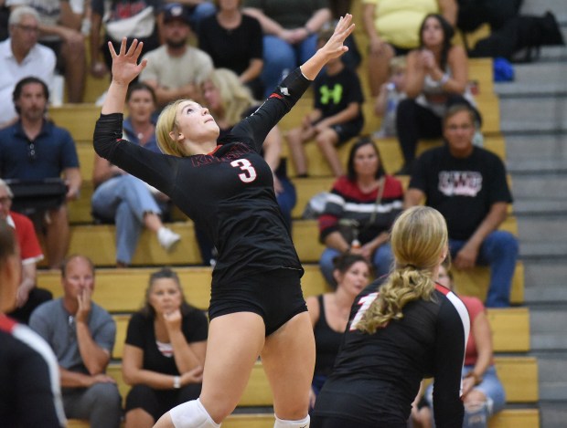 Lincoln-Way Central's Morgan Kozlowski (3) goes up for a spike against Crete-Monee during a nonconference match Monday, Sept. 9, 2024 in New Lenox, IL. (Steve Johnston/Daily Southtown)